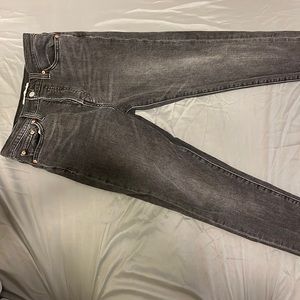 Worn once UO distressed black skinny jeans